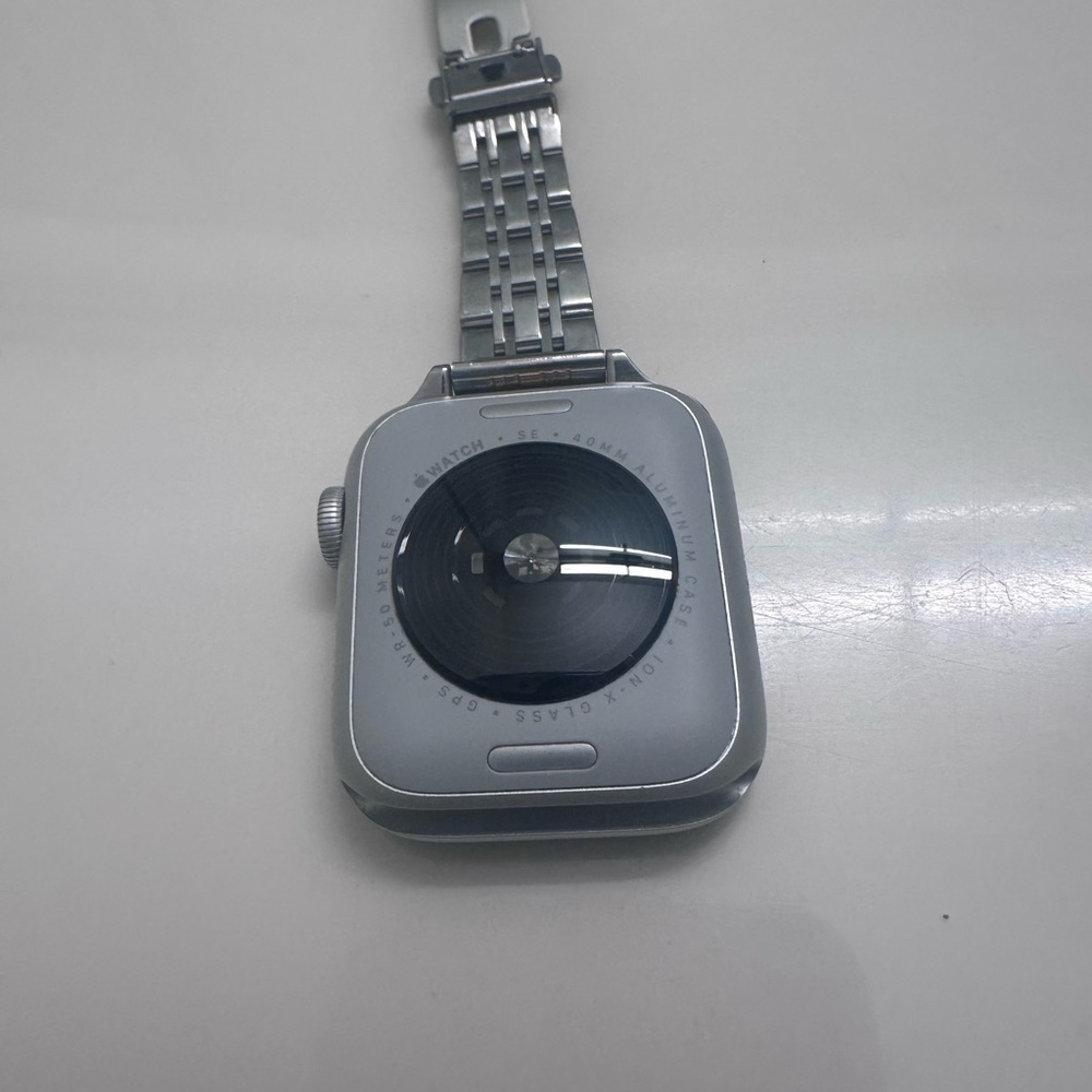 Apple Smartwatch with Silver and Gold Accents - Picture 3 of 8